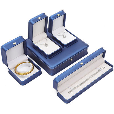 Nuovissima confezione di gioielli Croce di pelle blu Gioielleria per bracciale Pendente Collare Anello