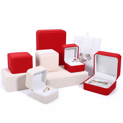 Scatola di imballaggio per collane di lusso personalizzata in pelle PU rossa con rivestimento di velluto e Contattaci