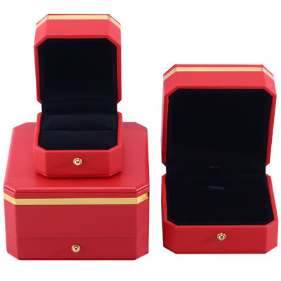 comprare Incantevole scatola di imballaggio di lusso in cuoio PU octagonale rosso con guarnizione in oro online manufacture