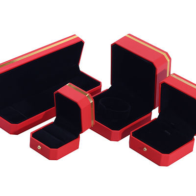 Incantevole scatola di imballaggio di lusso in cuoio PU octagonale rosso con guarnizione in oro