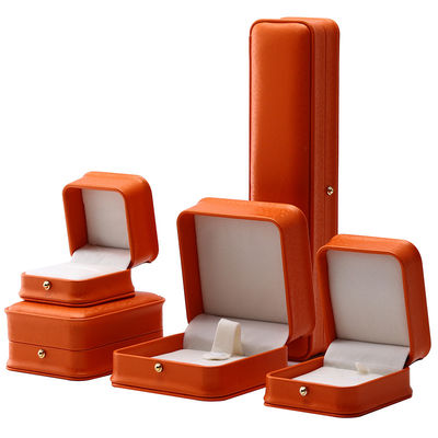 comprare Orange Snow Grain Noble PU Leather Jewelry Box per imballaggi di lusso online manufacture