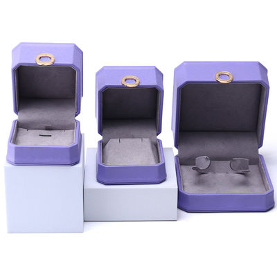 Capotazione viola ottagonale PU gioielleria in cuoio scatola per anello orecchie pendenti
