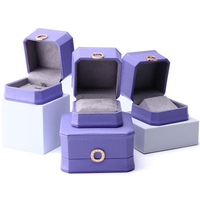 Capotazione viola ottagonale PU gioielleria in cuoio scatola per anello orecchie pendenti