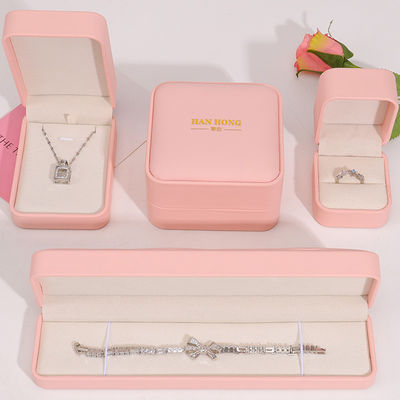 Manifattura all'ingrosso Gioielli Premium Confezioni per scatole Logo personalizzato Colletto Bracciale Orecchini Anello Confezioni in pelle rosa Confezioni per gioielli